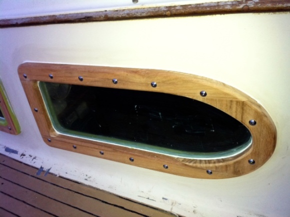 WestWindII new structural teak framed port light with 1/2 " tempered glass (exterior view).
